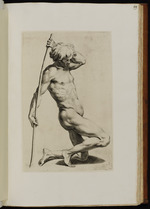 Kniende männliche Aktstudie einen Stab haltend